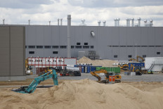 In this file photo taken on May 17, 2021 the construction site for the new plant, the so-called 'Giga Factory', of US electric carmaker Tesla is pictured in Gruenheide near Berlin, northeastern Germany.