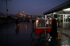 A vendor sells traditional Turkish bakery 
