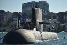 The Royal Australian Navy's HMAS Waller (SSG 75), a Collins-class diesel-electric submarine, is seen in Sydney Harbour on Nov. 2, 2016. Australia scrapped a multi-billion-euro submarine deal with France in favor of nuclear-powered American and British alternatives, sparking fears of an arms race.