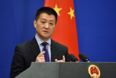 Then-spokesman of the Chinese Foreign Ministry Lu Kang speaks during a briefing in Beijing on March 28, 2018.
