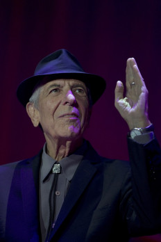 The singer-poet: Canadian singer Leonard Cohen gestures as he performs on stage in Rotterdam, the Netherlands, on Sept. 18, 2013. 