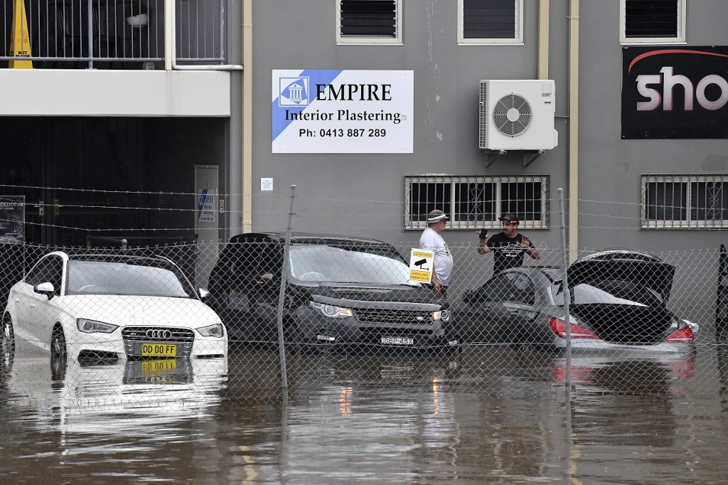 Rising rivers force more Sydney flood evacuations as rain eases