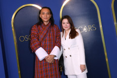 First nomination: Bhutanese filmmaker Pawo Choyning Dorji and Stephanie Lai arrive for the 94th Annual Oscars Nominees Luncheon at the Fairmont Century Plaza Hotel in Los Angeles, California, the United States, on March 7. 