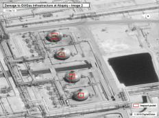 This satellite overview handout image obtained September 16, 2019 courtesy of the US Government shows damage to oil/gas infrastructure from weekend drone attacks at Abqaig on September 15, 2019 in Saudi Arabia. Drone attacks on key Saudi oil facilities have halved crude output from OPEC's biggest exporter, catapulting oil prices by the largest amount since the first Gulf War. 