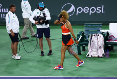 Naomi Osaka of Japan walks back to the baseline after becoming upset from a comment made by a spectator whilst playing against Veronika Kudermetova of Russia in their second round match on Day 6 of the BNP Paribas Open at the Indian Wells Tennis Garden on March 12, 2022 in Indian Wells, California.
