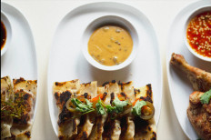 East meets West: Pò SupperKlab's beef bacon dumplings take center stage. (Courtesy of Pò SupperKlab)