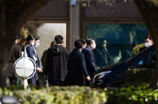 Members of the Chinese diplomatic delegation leave the Cavalieri Waldfor Astoria hotel in Rome on March 14, 2022 where US president's national security adviser, Jake Sullivan, met with senior Chinese Communist Party diplomat Yang Jiechi. The two officials and their teams 
