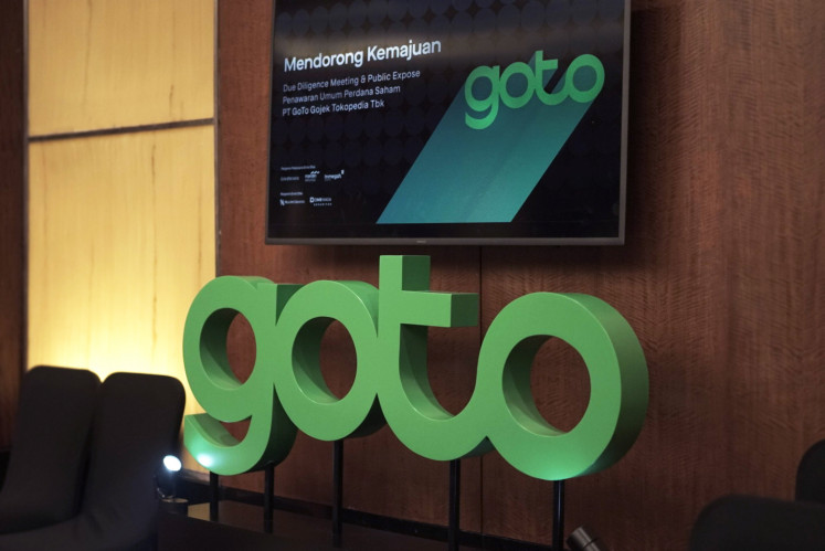 The GoTo logo sign adorns the technology conglomerate’s head office in Kebayoran Baru, South Jakarta, in this handout photo.