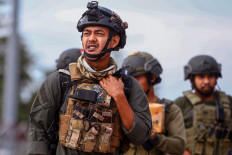  At least two killed in Papua protest clashes 