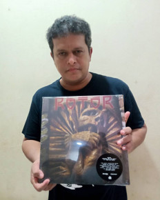 Drumming legend: Bakar Bufthaim, former drummer of '90s Indonesian thrash metal band Rotor, shows off the vinyl for the band's debut album 'Behind the 8th Ball' on May 11, 2021. (Instagram/Courtesy of Bakar Bufthaim)