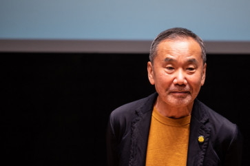 Japanese writer Haruki Murakami attends a press conference during a media preview of The Waseda International House of Literature, also known as Haruki Murakami Library, which is designed by Japanese architect Kengo Kuma, at Waseda University in Tokyo on September 22, 2021. 