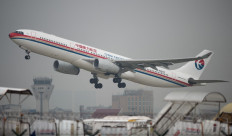 This photo taken on August 28, 2014 shows a China Eastern Airlines plane taking off at Shanghai's Hongqiao airport. 