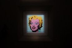 Legendary artwork: Andy Warhol's 1964 Shot Sage Blue Marilyn is displayed during a press preview on Monday in New York, the United States. 