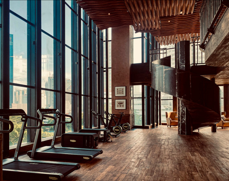 Workout sessions: The gym opens for 24 hours. The mezzanine floor features a studio for yoga and Pilates routines. (Courtesy of The Orient Hotel Jakarta)