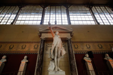 A photograph taken on March 2, 2022 shows the statue of French astronomer, mathematician, freemason, and political leader Jean Sylvain Bailly at the Jeu de Paume hall in Versailles, near Paris.