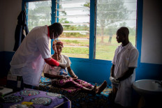 Check-up: A health worker tends to a patient during a medical check-up at a health center in Sakoungou in the Central African Republic on March 11.