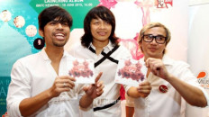 All about religion: Boyband Gigi, comprising Arman Maulana (center), Thomas (right) and Hendi, launch their religious-themed album titled Mohon Ampun (Begging for Mercy) in Kemang, South Jakarta, ahead of Ramadan on June 10, 2015.