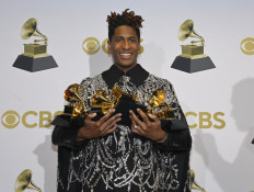 Jon Batiste winner of best American roots performance, best American roots song, best music video and best score soundtrack for visual media poses in the winners photo room during the 64th Annual GRAMMY Awards at MGM Grand Garden Arena on April 03, 2022 in Las Vegas, Nevada. 
