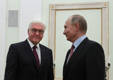 Russian President Vladimir Putin (right) welcomes his German counterpart Frank-Walter Steinmeier during a meeting at the Kremlin in Moscow on October 25, 2017. 