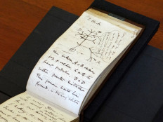 Lost and found: A handout image released by the University of Cambridge Library on Tuesday shows the returned 1837 Tree of Life sketch on a page from one of the lost notebooks of British scientist Charles Darwin. 