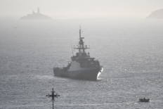 The offshore naval vessel HMS Tamar patrols the waters off St Ives, Cornwall during the G7 summit on June 12, 2021. 