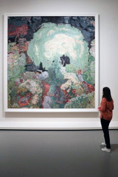 The collection: A woman looks at the painting 'Autumn. Fruit Picking' (1912) by French painter Pierre Bonnard during a press visit of the exhibition The Morozov Collection — Modern art icons at the Louis Vuitton Foundation in Paris on Sept. 15, 2021.