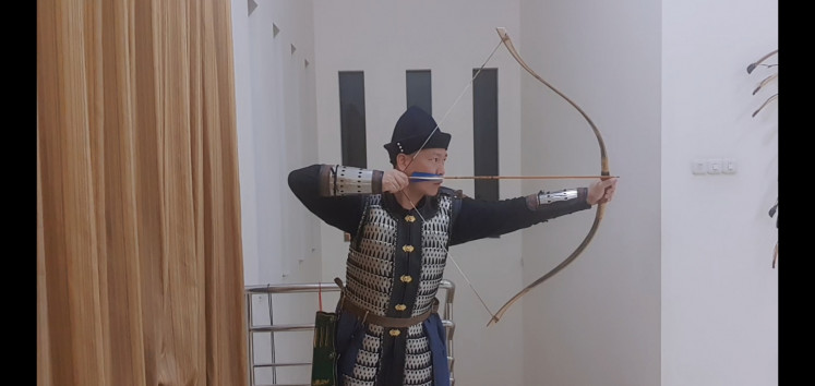 Archery style: Albertus has been training under Justin Ma, whose book is widely regarded as a major milestone in the renaissance of Chinese archery. (Courtesy of Albertus Wartono)