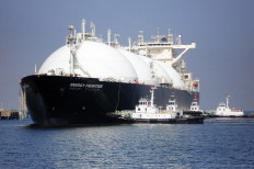 A liquefied natural gas (LNG) tanker arrives at a gas storage station at Sodegaura city in Chiba prefecture, east of Tokyo, Japan, on April 6, 2009 for the first shipment of LNG from Sakhalin-2 natural gas development project in Sakhalin, Russia. 