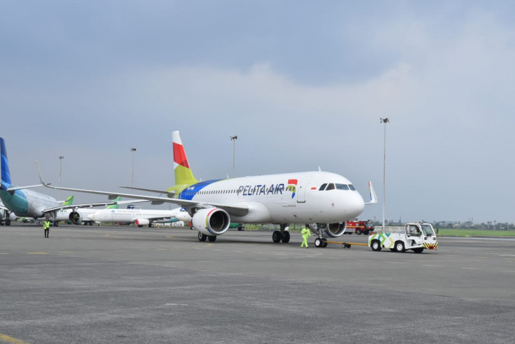 A Pelita Air Airbus A320 aircraft lands at Soekarno Hatta International Airport in Tangerang, Banten, on April 11, 2022.