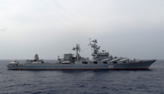 In this file photo taken on December 17, 2015 the Russian missile cruiser Moskva patrols in the Mediterranean Sea, off the coast of Syria, on December 17, 2015. 