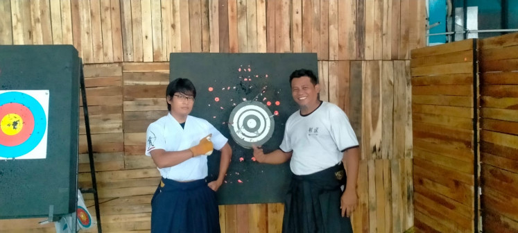 Give it a try: Numair (left) and Angking both practice other archery styles, including Chinese archery. (Courtesy of Heki Ryu Indonesia)