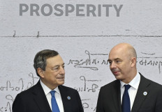 Italy's Prime Minister, Mario Draghi (left) greets Russian Finance Minister, Anton Siluanov as he arrives for the G20 of World Leaders Summit on October 30, 2021.