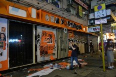 A vandalised Yoshinoya eatery is seen as a pro-democracy march was held in the Kowloon district in Hong Kong on October 20, 2019. Police fired water cannon and tear gas at Hong Kongers who defied authorities with an illegal march on October 20, their numbers swollen by anger over the recent stabbing and beating of two pro-democracy protesters.