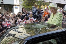 In this file photo taken on April 21, 2016 Britain's Queen Elizabeth II greets wellwishers during a 'walkabout' on her 90th birthday in Windsor, west of London. Gun salutes will ring out Thursday to mark Queen Elizabeth II's 96th birthday, although the monarch herself was expected to mark the occasion with little fanfare.