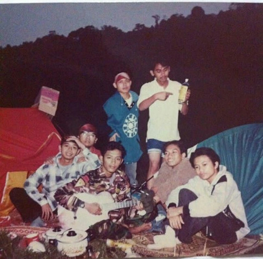 Together forever: Hadi (blue shirt) is pictured with his close-knit schoolmates during a trip in 1996. (Courtesy of Hadi)