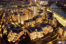 New penthouses: Nighttime view of a terraced residential district on a bank of the Pothong River in Pyongyang, North Korea, in this undated photo released by North Korea's Korean Central News Agency (KCNA) on April 14.