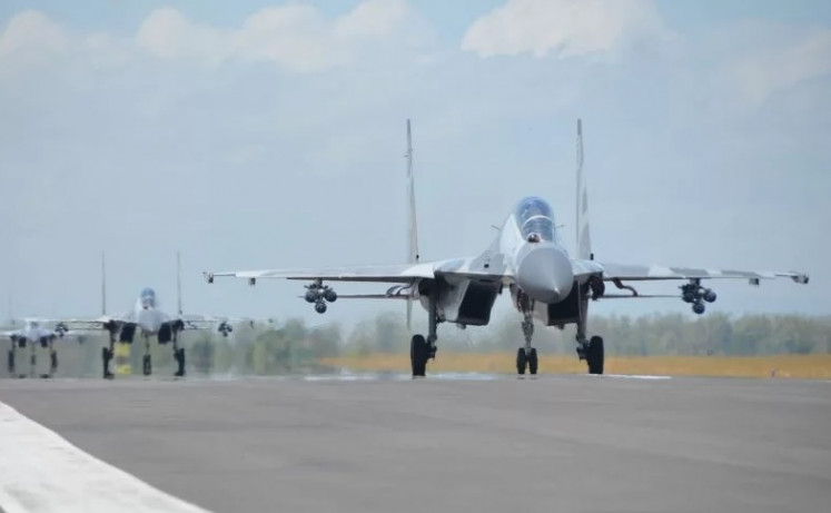 Members of the Indonesian Air Force in Sukhoi fighter aircraft prepare to take off on Sept. 29, 2020 from Iswahjudi Air Base in Magetan, East Java, to take part in a military exercise at the Pandanwangi Air Weapons Range in Lumajang, also in East Java.
