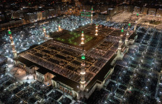 This handout aerial image released by the Saudi press Agency (SPA) shows Muslim worshippers praying at the Al-Masjid an-Nabawi (Prophet's Mosque) in Saudi Arabia's holy city of Medina, late on April 29, 2022, during the fasting month of Ramadan.
