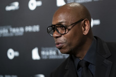 In this file photo taken on October 27, 2019, US comedian Dave Chappelle arrives at the Kennedy Center for the Mark Twain Award for American Humor ceremony in Washington, DC.