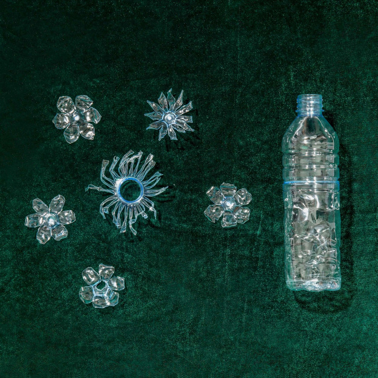 Repurposed craft: TAM ILLI held a workshop in collaboration with bottled water giant Aqua on crafting accessories from used plastic bottles, like the decorative items shown here.  (Courtesy of Natasha Jasmin Aprilia)