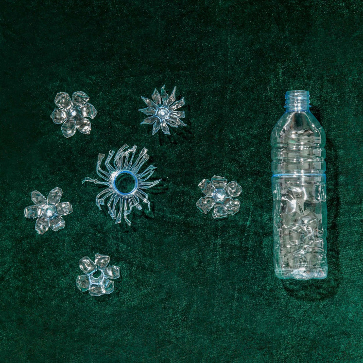 Repurposed craft: TAM ILLI held a workshop in collaboration with bottled water giant Aqua on crafting accessories from used plastic bottles, like the decorative items shown here. (Courtesy of Natasha Jasmin Aprilia)