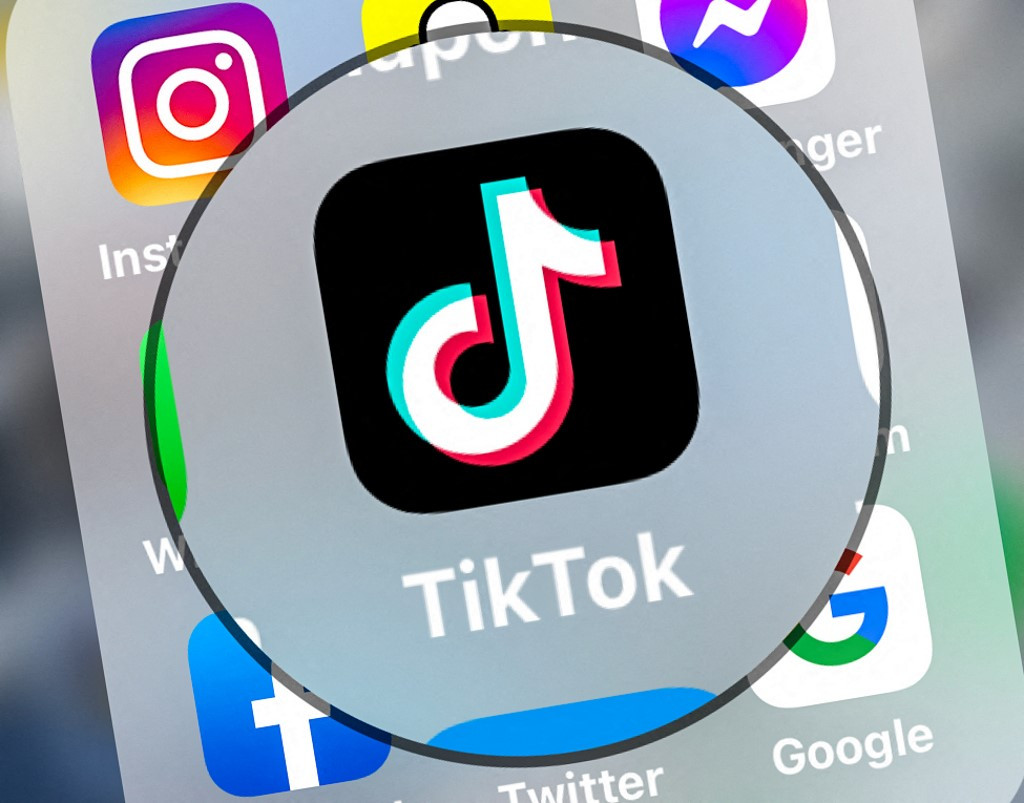 This photograph taken on March 23, 2022, shows logo of the networking application TikToK displayed on a tablet in Lille, northern France.