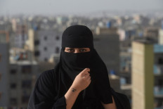 Behind the veil: The double life of Pakistan rapper Eva B