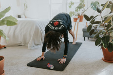 Top tips: If you find it hard to muster the motivation to exercise at home, creating a designated workout area may do the trick. (Unsplash/Cole Keister)