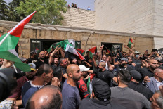 Israel arrests Al Jazeera reporter pallbearer