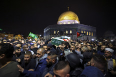 Dozens hurt in clashes at Palestinian funeral in Jerusalem