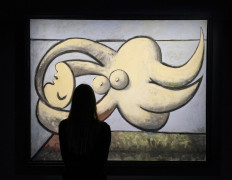 Priceless art: A visitor admires Pablo Picasso’s Femme nue couchée during the New York press preview on May 6 of Sotheby's Macklowe Collection spring auction in the United States.
