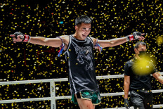 ONE featherweight Muay Thai world champion Petchmorakot Petchyindee celebrates after defeating Magnus Andersson in September 2020