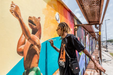 Graffiti brings Benin's walls alive with treasures from past