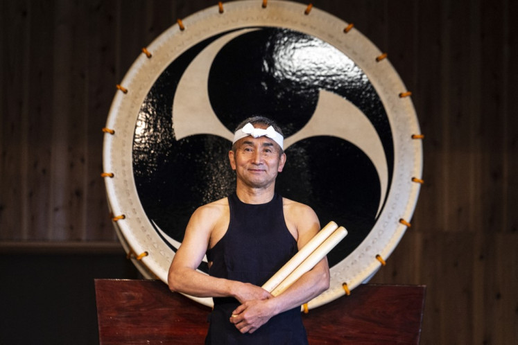 Veteran vitality: Originally from Kyoyo, 71-year-old performer Yoshikazu Fujimoto, who specializes in performing the o-daiko and helped found Kodo, poses after a performance on May 7 on Sado Island.